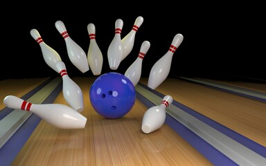 bowling strike. Skittles and bowling ball on the track