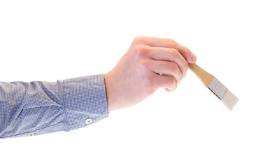 hand holding a brush isolated on white background