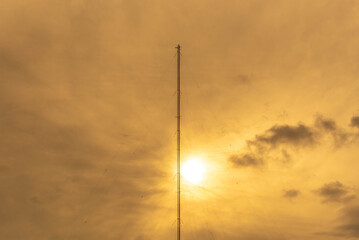 Radio Frequency Modulated Wave Transmission Tower - FM in contrast with the sunset