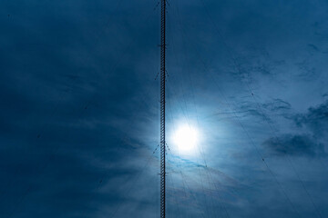 Radio Frequency Modulated Wave Transmission Tower - FM in contrast with the sunset