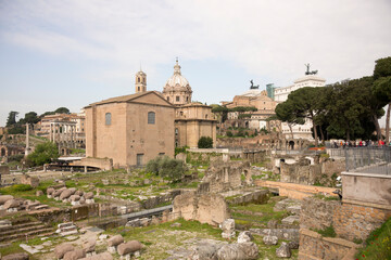 Fototapeta na wymiar Tourists visiting the Roman Forum