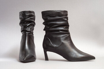 Women's boots with folds on the shaft, the effect of folded leather.
