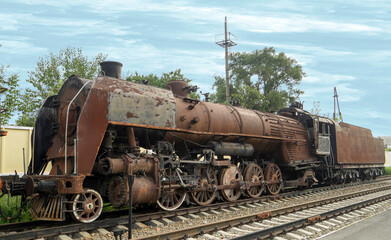 Fototapeta na wymiar Rusty steam locomotive