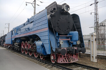 Fototapeta na wymiar The blue express steam locomotive