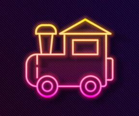 Glowing neon line Toy train icon isolated on black background. Vector.