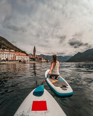 Amazing point of view with tourists on SUP stand up paddle board  with view to Natural and...