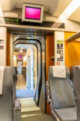 Empty Train Seats and Aisle