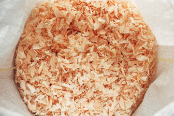 Wood shavings in a bag. Copy, empty space for text