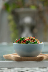 Stir fried minced pork with basil leaves on  thai jasmin rice , thai street food