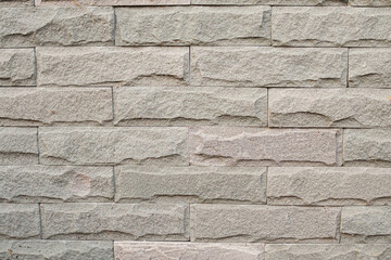 sandstone brick wall is clastic sedimentary rock with grunge texture.Use for background, insert text and use as advertising image.