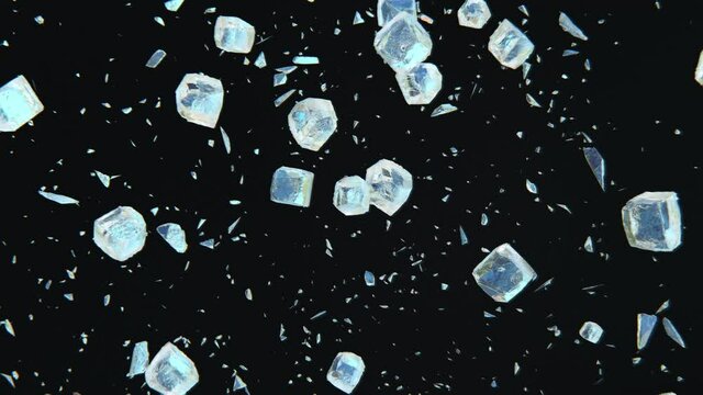 Dynamic jumping frosted ice cubes in 4K Slow motion