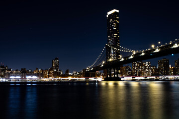 long exposure of city bridge at night