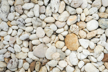 White bebbles stone or river stone  background with vintage filter 