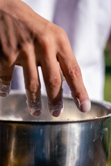 closeup of hands cooking making bakery ingredients at high speed in the countryside with natural light cordoba argentina