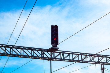 Railway signaling and wires. Red stop signal in railway. Railway engineering. Signaling systems.