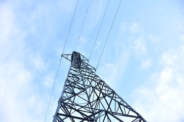 Electricity tower seen from the base. Sunny and cloudy day in the Cidacos valley.