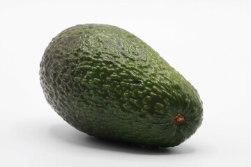 Whole avocado, isolated on a white background 
