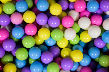 Top view of colorful dry pool balls one on another