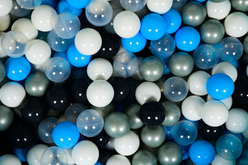 Top view of colorful dry pool balls one on another
