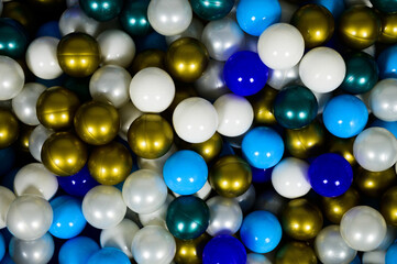 Top view of colorful dry pool balls one on another