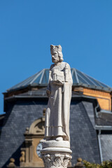 White statue on a fountain in the city Meiningen