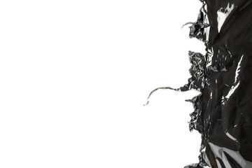 Plastic black background. Wrap transparent dark cellophane isolated on white with copy space. Black...