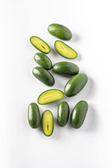 Stoneless mini avocado or cocktail avocado. Cocktail avocado has edible skin. It is formed from unpollinated blossoms, which prevents formation of the stone and halts growth.