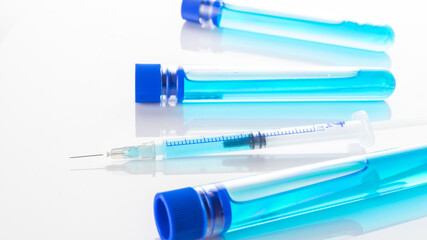Vaccination viruses. Medical syringe with needle for protection flu virus and coronavirus. Covid...