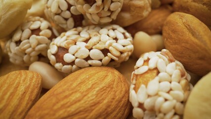 Organic mixed nuts as background. Natural background made from different kinds of nuts. Nuts close up.