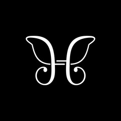 Butterfly icon. Abstract letter H on dark background