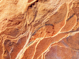 Eroded thin layers in red sandstone