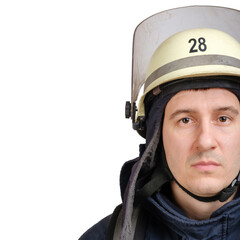 Close up face of young brave man in uniform, hardhat of firefighter looking at camera isolated on white background