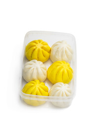 Steamed honey chicken and duck bao buns isolated on white