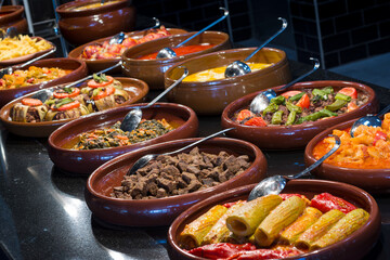 Traditional Turkish food in clay pot in a Turkish restaurant.