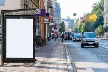 vertical blank white billboard at bus stop on city street