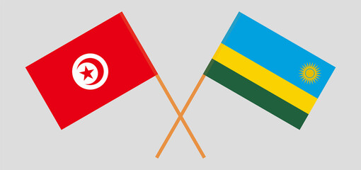 Crossed flags of Tunisia and Rwanda