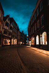 Fototapeta na wymiar Cambridge UK January 2021 Night time view of the streets of Cambridge city, empty during the covid national lockdown