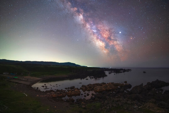 Clearly Milky way over shore of Oga town, Japan Long exposure night landscape view