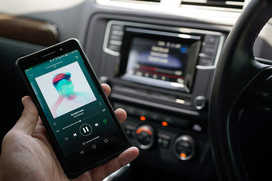 KUALA LUMPUR, MALAYSIA - January 4TH, 2020 : Spotify Swedish music service that offers legal streaming music. It provides high quality Audio. User browse trending music sync with Car Bluetooth Audio.