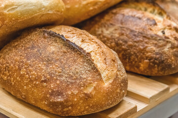 Craft bread on the table at the bakery. The concept of small industries and healthy food
