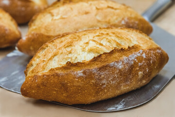 Craft bread on the table at the bakery. The concept of small industries and healthy food
