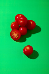 Tomatoes on a green background