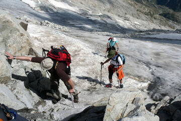 Mountaineers climbing at Mount Pico de Aneto in Huesca, Spain. Pico de Aneto is the highest mountain in Pyrenees at 3404 meters.