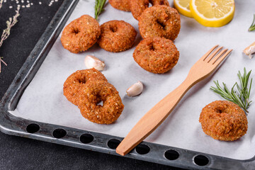 Beautiful delicious fresh chickpea falafel with sauces on a concrete background