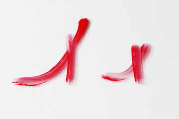 brush painted "x" letter in red colour