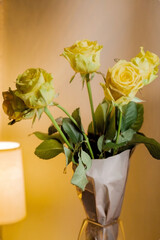 Bouquet of yellow roses on a orange backgroun