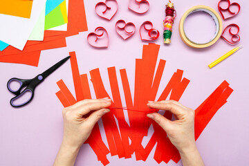DIY instruction. Step by step guide. The process of making a garland of hearts for Valentine's Day
