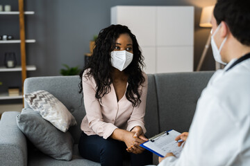 African Patient In Living Room At Home