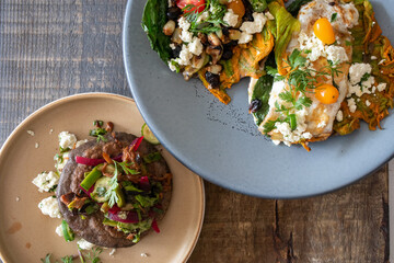 Gourmet Mexican food with a gordita and two tacos made from hoja santa (holy leaf)