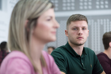 IT workshop at university. Group of Students on class with computer